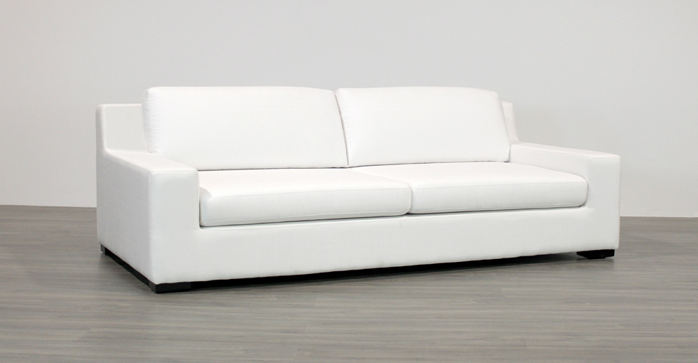 white fabric sofa