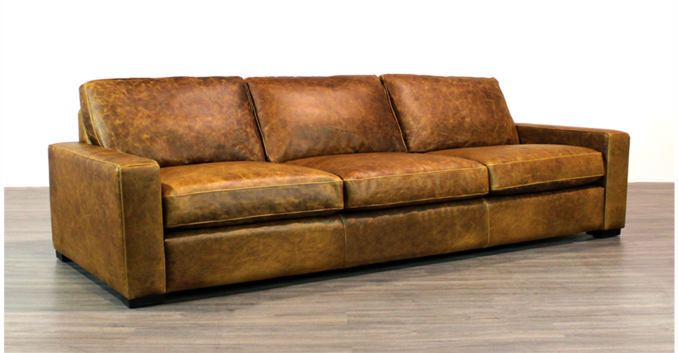 manhattan or genesis leather reclining sofa