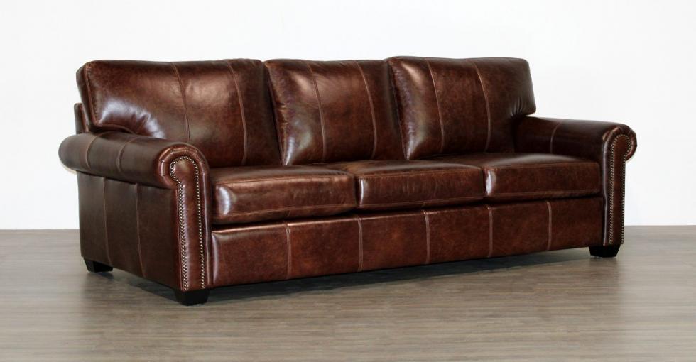 brown leather sofa with back cushions with seams