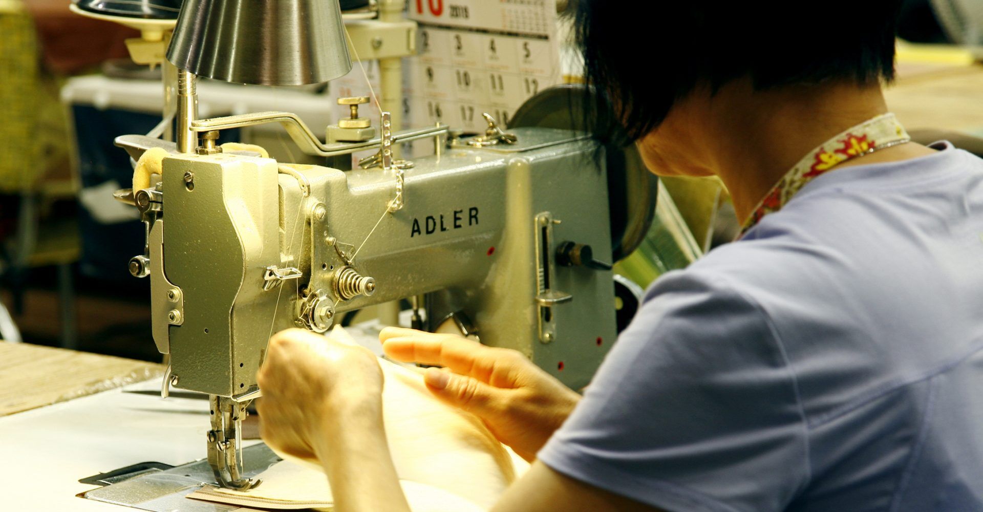 woman-sewing-history-page